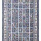 A Qaleen Carpets rug with a blue and white patterned design, featuring intricate patterns and a central medallion