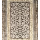 A Qaleen Carpets rug with a traditional Persian design, featuring intricate patterns and a rich, vibrant color palette