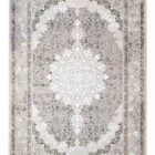 A Qaleen Carpets rug with a traditional Persian design, featuring intricate patterns and a soft, neutral color palette