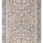 A Qaleen Carpets rug with a traditional Persian design, featuring intricate patterns and a rich, vibrant color palette