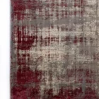 Qaleen Carpets' stunning rug with a rich, deep red and grey pattern
