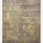 A Qaleen Carpets rug with a unique, hand-woven design featuring a blend of traditional and modern elements, with a focus on