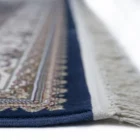 Carpets A close-up of a carpet's edge, with a focus on the intricate patterns and colors