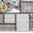 A beautiful, high-quality carpet with a unique, intricate design, featuring a mix of patterns and colors, perfect for adding