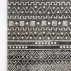 Qaleen Carpets' stunning grey and white geometric patterned rug