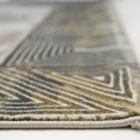 A close-up of a Qaleen Carpets rug, showcasing its intricate patterns and high-quality materials