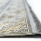 Carpets A close-up of a carpet's edge, with a focus on the intricate design and the soft, fluffy texture of the carpet's edge