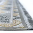 Carpets A close-up of a carpet's edge, with a focus on the intricate design and the soft, fluffy texture of the carpet's edge