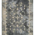 Carpets A rug with a dark grey background and a gold floral pattern, with a gold border around the edges
