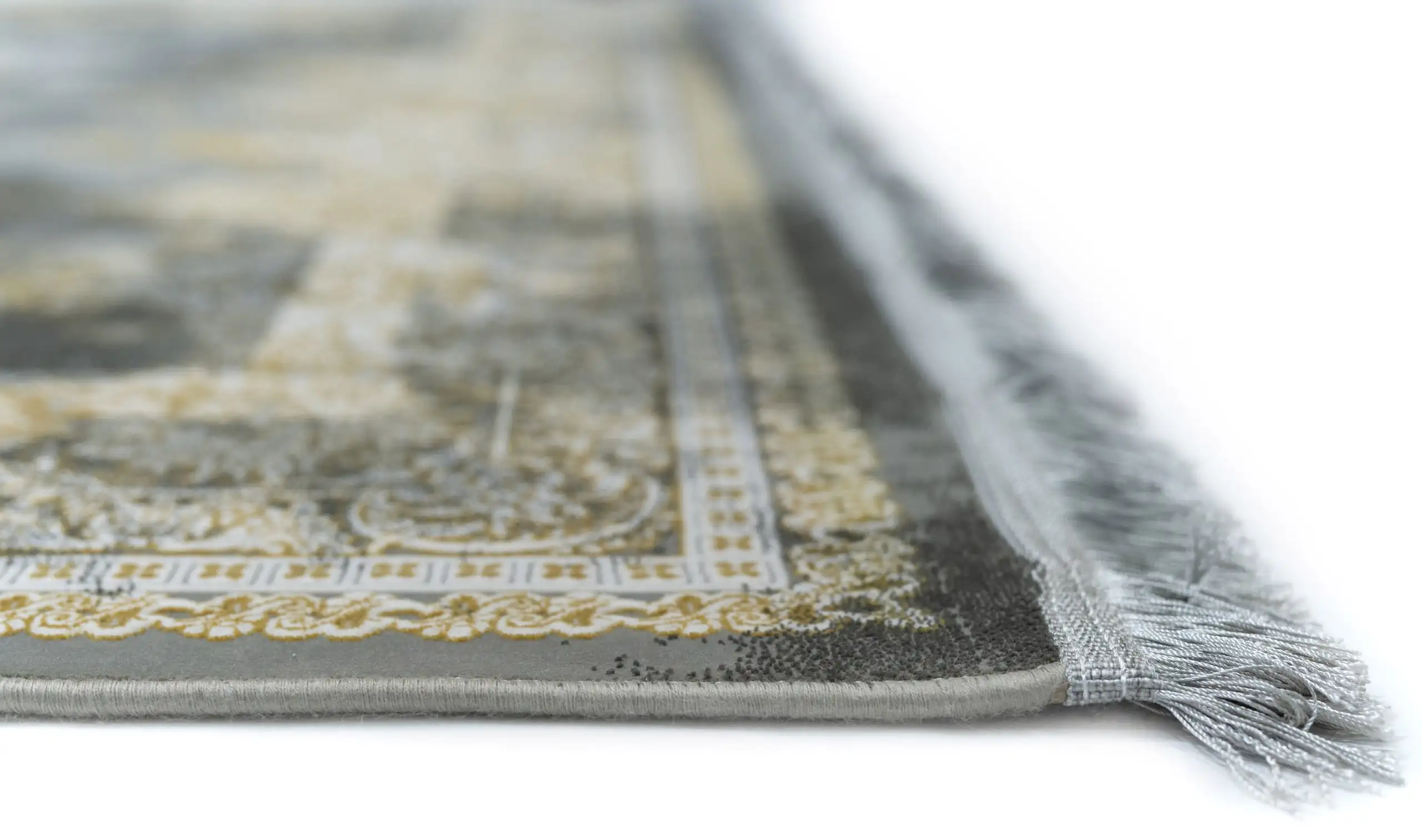 Carpets A close-up of a carpet's edge, with a focus on the intricate patterns and textures