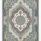 A stunning, intricately designed carpet with a central medallion and intricate patterns, showcasing the art of carpet design