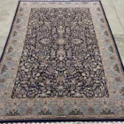 Carpets A beautiful, intricately designed carpet with a mix of blue, gold, and red colors