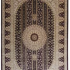Carpets A beautiful, intricately designed carpet with a central medallion and intricate patterns, showcasing the art of