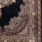 Carpets A beautiful, intricately designed carpet with a dark background and intricate patterns