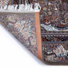 Carpets A beautiful, intricately designed carpet with a rich, vibrant pattern, showcasing the art of carpeting and rug design
