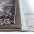 Carpets A close-up of a carpet's edge, with a focus on the intricate patterns and colors
