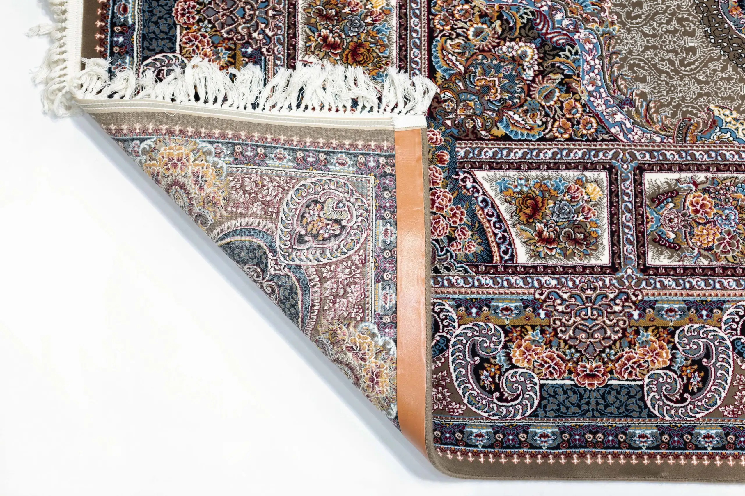 Carpets A close-up of a carpet's edge, with intricate patterns and colors