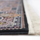 Carpets A close-up of a carpet's edge, with a focus on the intricate patterns and colors