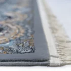 Carpets A close-up of a carpet's edge, with a focus on the intricate design and texture
