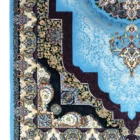 Carpets A beautiful, intricately designed carpet with a mix of blue, gold, and white colors