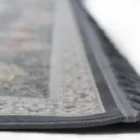 Carpets A close-up of a rug's edge, with a focus on the intricate carpeting