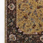 Carpets A beautiful, intricately designed carpet with a rich, golden color and a delicate, floral pattern