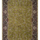 Carpets A beautiful, intricately designed carpet with a green and black patterned border, featuring a central green area