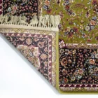 Carpets A beautiful, intricately designed carpet with a rich, vibrant pattern, showcasing the art of carpeting and rug design