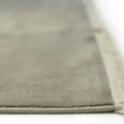 Carpets A close-up of a carpet's edge, with a focus on the stitching and the carpet's texture