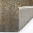 A high-quality image of a carpet with a subtle, intricate design, showcasing the beauty of carpets and rugs