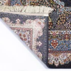 Carpets A carpet with a floral pattern and intricate designs