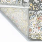 Carpets A beautiful, intricately designed carpet with a floral pattern, showcasing the art of carpeting