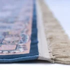 Carpets A close-up of a carpet's edge, with a focus on the intricate patterns and colors