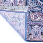 A beautifully crafted carpet with intricate patterns and a rich, vibrant color palette, showcasing the art of carpeting and