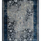 Carpets A beautiful, old, and worn-out carpet with a floral pattern