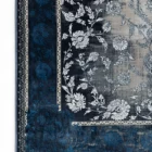 Carpets A close-up of a carpet's edge, with a blue and white floral pattern
