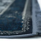 Carpets A close-up of a rug's edge, showcasing its intricate design and carpet-like texture