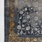 Carpets A beautiful, old, and worn-out carpet with a floral pattern