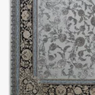 Carpets A beautiful, intricately designed carpet with a mix of floral and geometric patterns