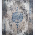 Carpets A beautiful, intricately designed carpet with a mix of blue, white, and beige colors, featuring a central pattern