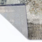 A beautiful, high-quality carpet with a unique, intricate design, perfect for adding a touch of elegance to any room, with a