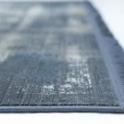 A close-up view of a Qaleen Carpets rug, showcasing its intricate design and texture