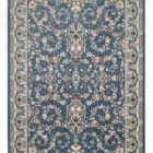 Carpets A blue and white rug with a floral pattern, featuring a border and a central design, is shown in this image