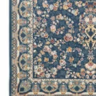 A beautiful, intricately designed carpet with a floral pattern, showcasing the art of carpets and rugs