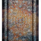 A beautiful, intricately designed carpet with a rich, vibrant color palette and a unique, intricate pattern, perfect for