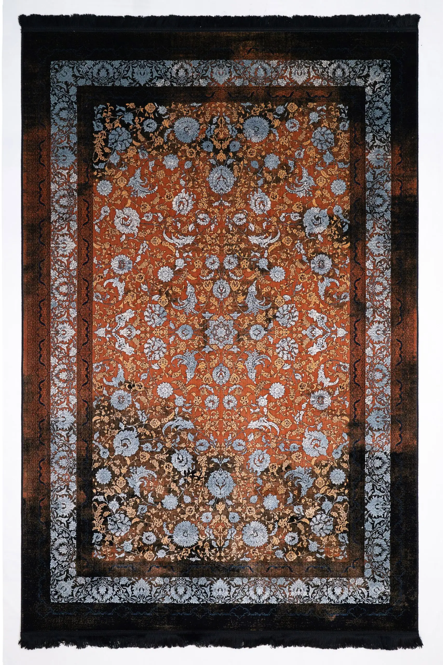 Carpets and Rugs: A Guide to Choosing the Right One Carpets A vibrant, intricately patterned rug with a mix of red, gold, and blue hues, featuring a central design of flowers