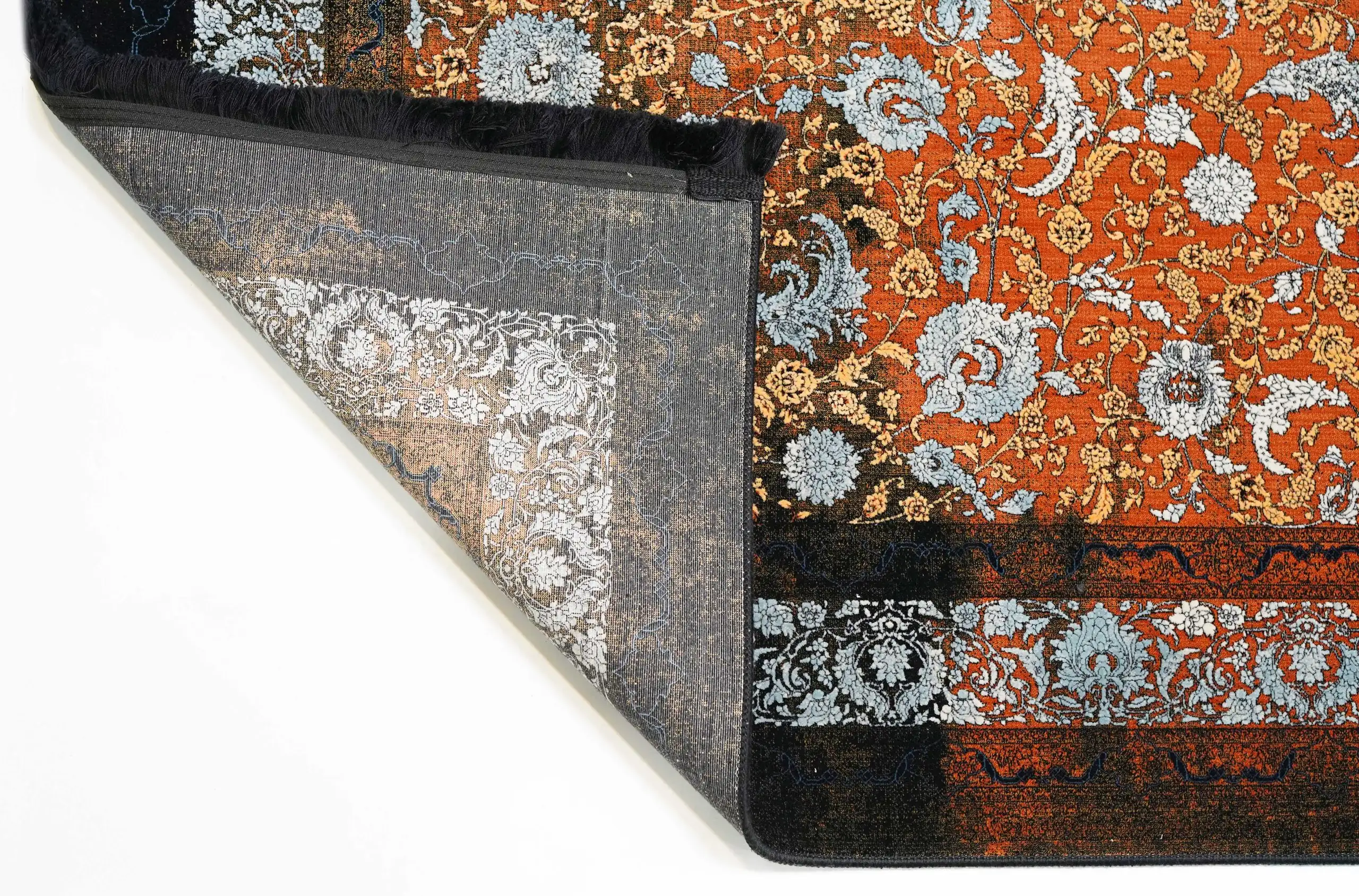 A beautifully crafted carpet with intricate patterns and a rich, vibrant color, perfect for adding a touch of elegance to