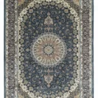 Carpets A beautiful, intricately designed Persian carpet with a rich, dark blue background and intricate patterns of gold