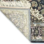 Carpets A carpet with a floral pattern and a fringe at the top
