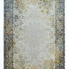 A Qaleen Carpets rug with a white background, gold and blue border, and intricate gold and blue patterns